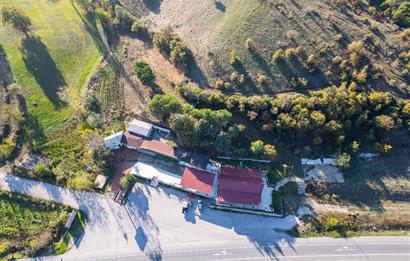 İZMİR YOLU ÜZERİNDE AKÇAKÖYDE SATILIK DAİRE FİYATINA 5000M2 TESİS