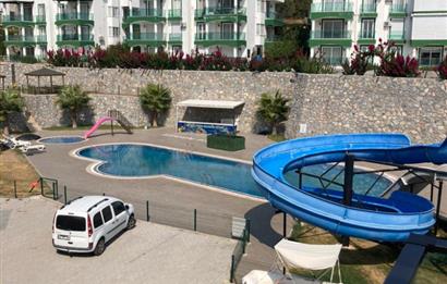 Bodrum Boğaziçi'de Göl Manzaralı, Aqua Parklı Site İçerisinde 2+1 Daire