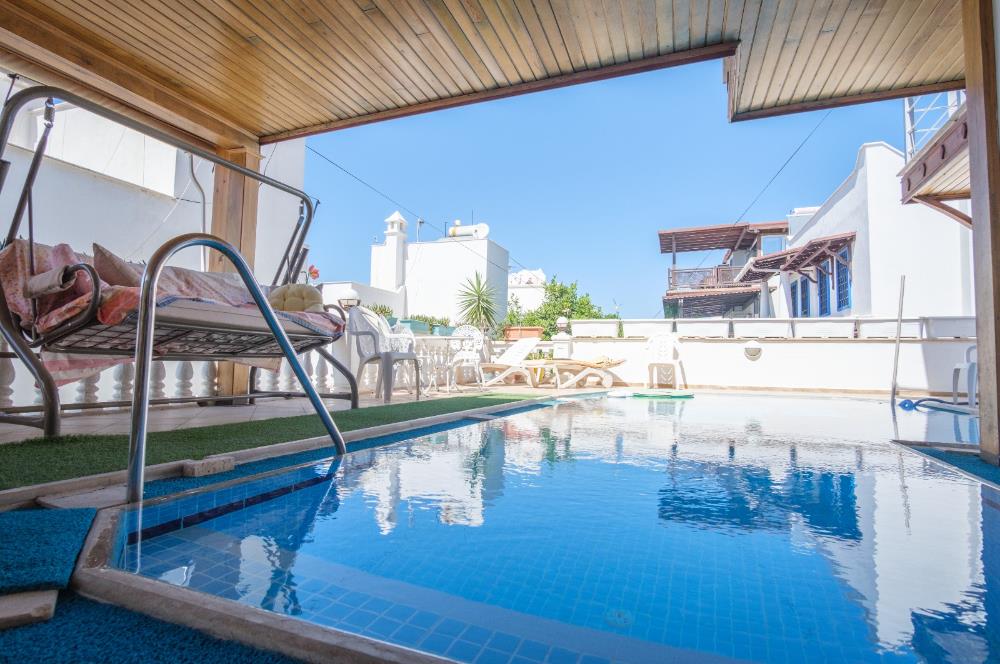 Bitez-Bodrum deniz manzaralı,müstakil havuzlu 5+1 satılık tripleks villa