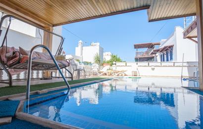 Bitez-Bodrum deniz manzaralı,müstakil havuzlu 5+1 satılık tripleks villa