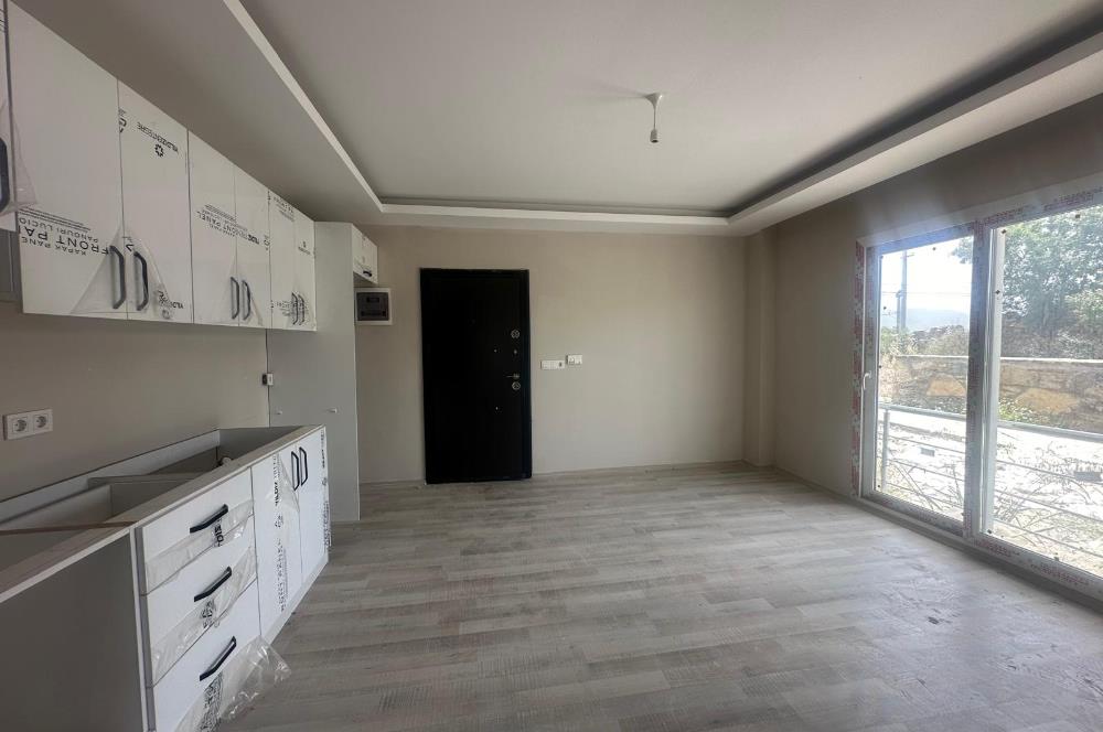 MUMCULAR MERKEZ HAVUZLU SİTEDE 2+1 BAHÇE KATI SATILIK DAİRE