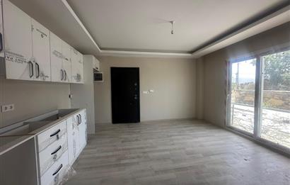 MUMCULAR MERKEZ HAVUZLU SİTEDE 2+1 BAHÇE KATI SATILIK DAİRE