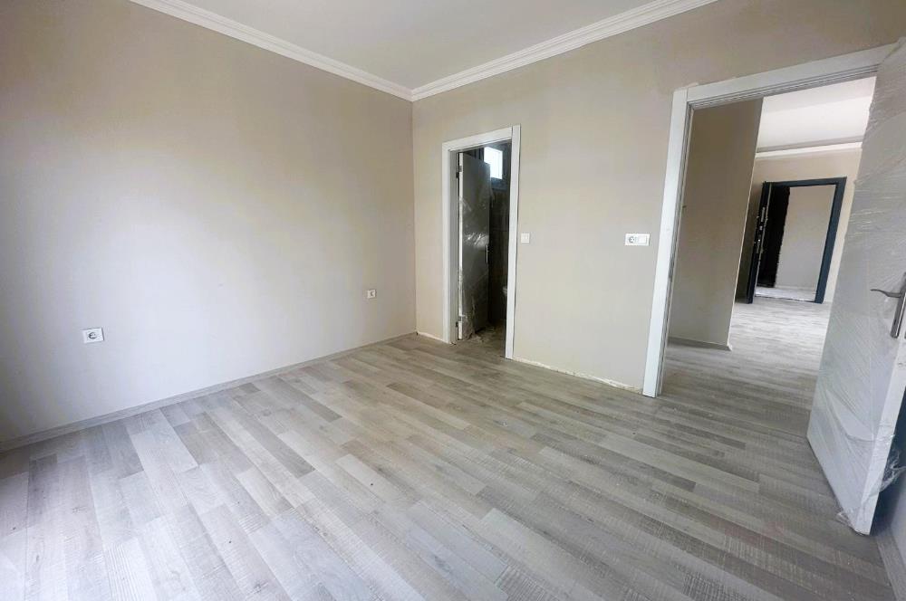 MUMCULAR MERKEZ HAVUZLU SİTEDE 2+1 BAHÇE KATI SATILIK DAİRE