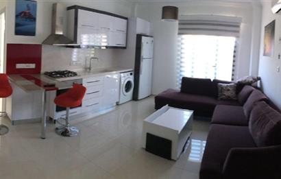 Girne merkez satılık komple bina. 18 Esyali apartman 2+1 ve 1+1 + lojman 10 oda. Yuksek kira getirisi.