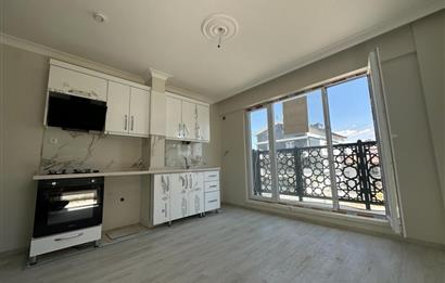 İNCEK MAHALLESİNDE BULVARA YAKIN ARA KAT 1+1 SATILIK DAİRE