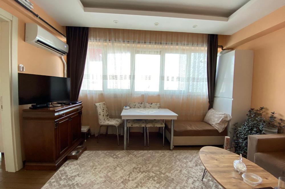 C21 NET'ten SATILIK Cadde cepheli 65m 1+1 Kiracılı Apart