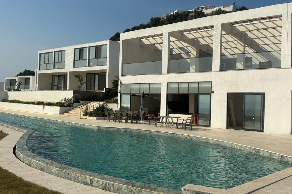 BODRUM GÜMÜŞLÜK PLAJLI İSKELELİ SOSYAL TESİSLİ SATILIK DAİRE