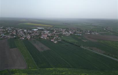 C21; YUKARISEVİNDİKLİ VILLAGE DEVELOPMENT BORDER 8300 M2 LAND FOR SALE