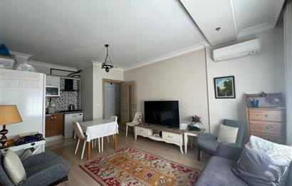 KARŞIYAKA'DA MERKEZİ KONUMDA AÇIK MUTFAK 1+1 SATILIK DAİRE