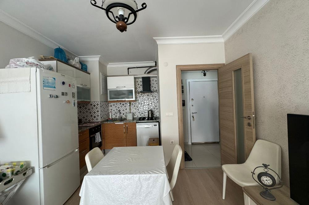 KARŞIYAKA'DA MERKEZİ KONUMDA AÇIK MUTFAK 1+1 SATILIK DAİRE