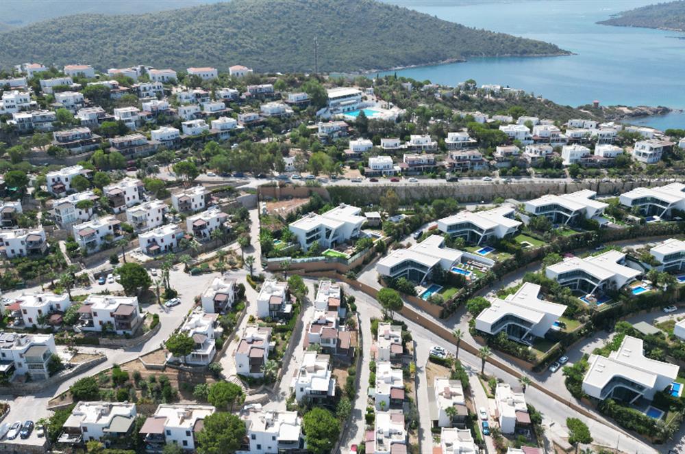 Adabükü 5 yıldızlı otel konseptinde çağdaş tasarım ödüllü,muhtesem deniz manzaralı satılık villa