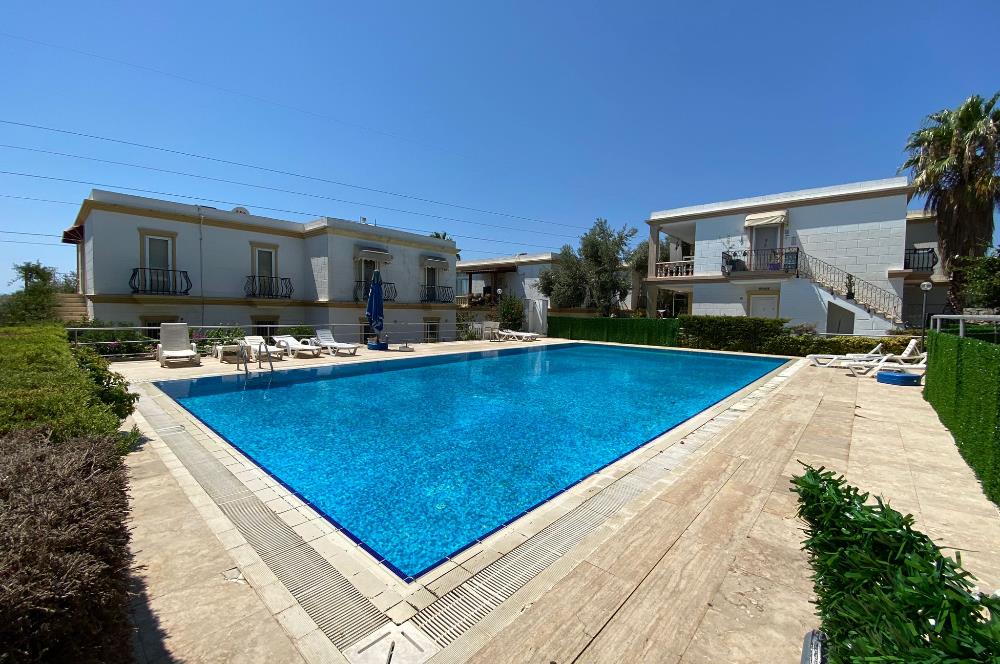 Bodrum Konacık'ta Havuzlu Site İçerisinde Satılık 2+1 Üst Kat Daire