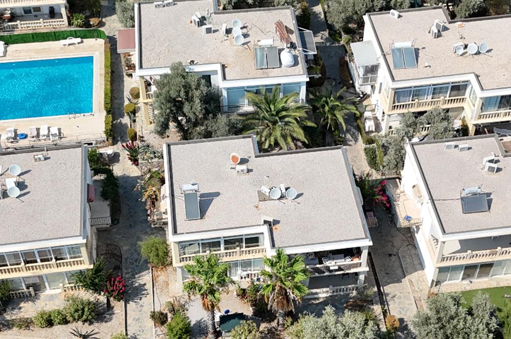 Bodrum Konacık'ta Havuzlu Site İçerisinde Satılık 2+1 Üst Kat Daire