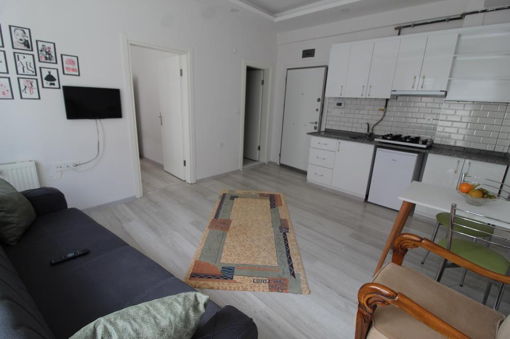 CENTURY 21 BAL'DAN ÇARŞI MERKEZDE EŞYALI 1+1 KİRALIK DAİRE