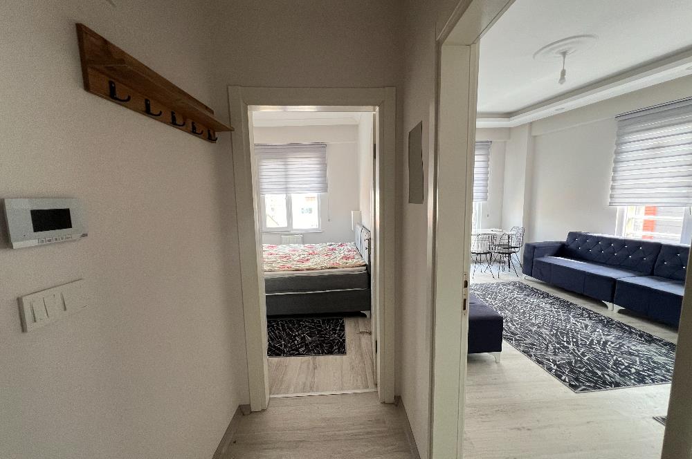 C21 BAL'DAN ÇARŞI MERKEZDE EŞYALI KİRALIK 1+1 YENİ DAİRE