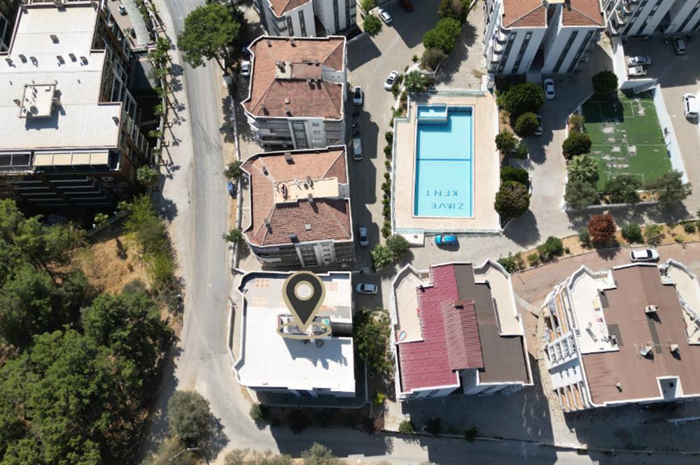 Kuşadası Ege Mahallesinde Deniz Manzaralı Havuzlu sitede 3+1 Daire