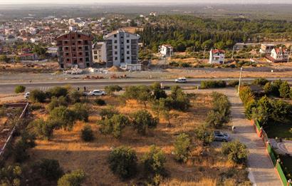 EZİNE GEYİKLİ’de 597 m2 Konut + Turizm İmarlı Yola Cepheli, Denize Yakın Arsa