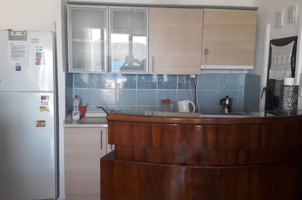 Bitez-Aktur'da deniz manzaralı,özel plajlı 4+1 dönemsel kiralık villa