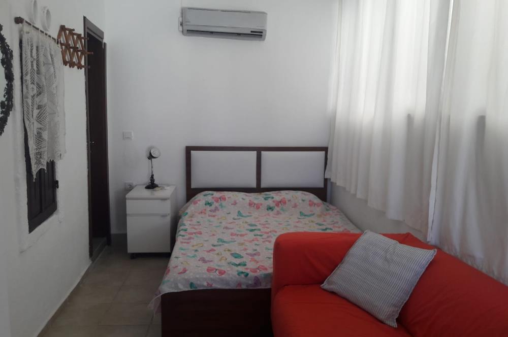 Bitez-Aktur'da deniz manzaralı,özel plajlı 4+1 dönemsel kiralık villa