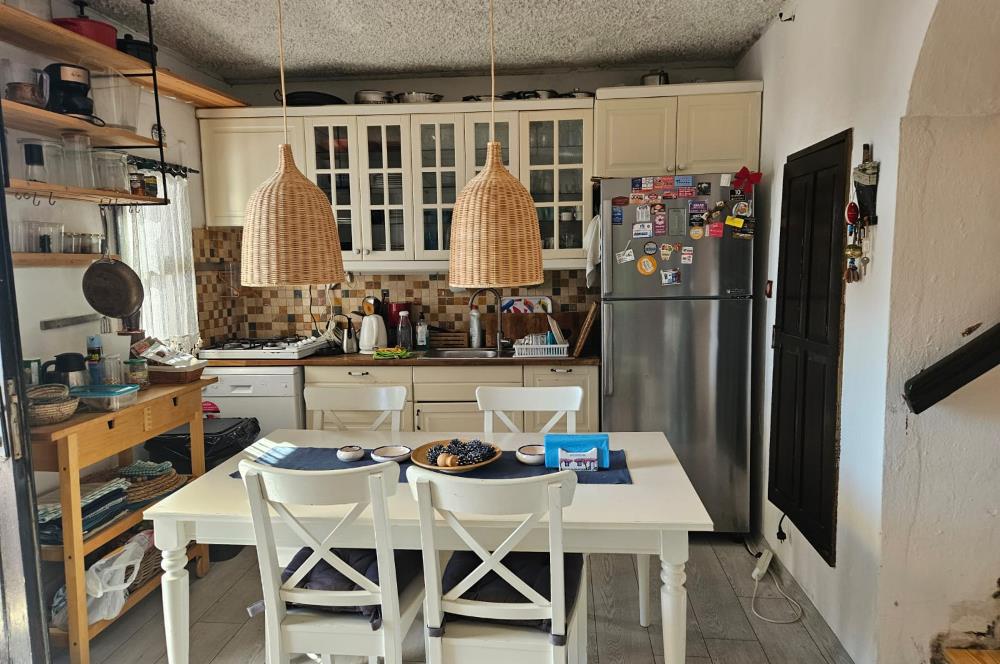 Bitez-Akturda 2+1 eşyalı. deniz manzaralı. plajlı sitede dönemsel kiralık daire