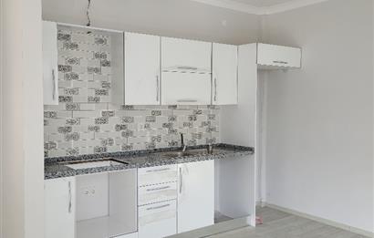 1+1 Yatırımlık Site içerisinde Deniz Manzaralı Satılık Daire 