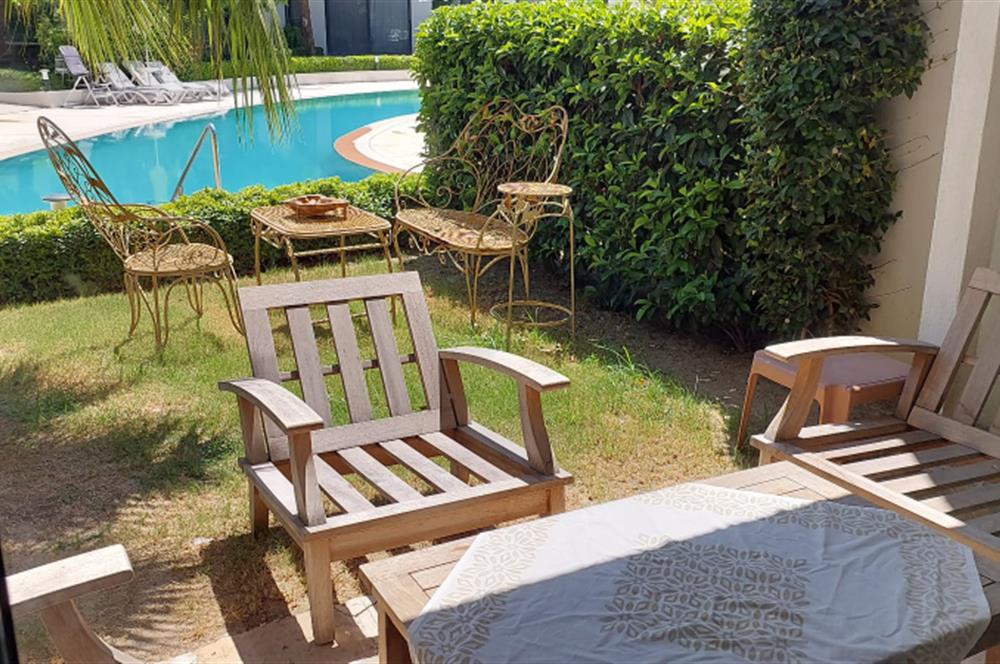Bodrum-Bitez havuzlu site içerisinde eşyalı 2+1 bahçe katı kiralık daire