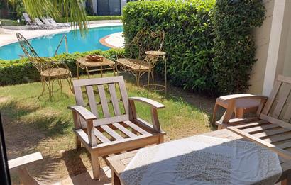 Bodrum-Bitez havuzlu site içerisinde eşyalı 2+1 bahçe katı kiralık daire