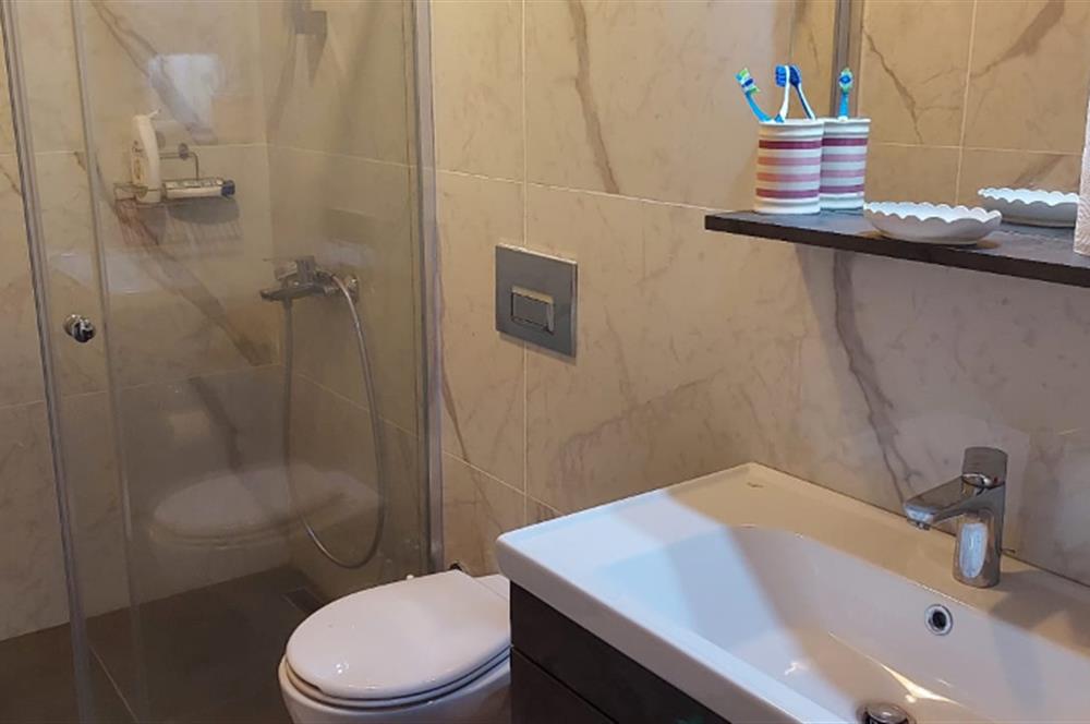 Bodrum-Bitez havuzlu site içerisinde eşyalı 2+1 bahçe katı kiralık daire