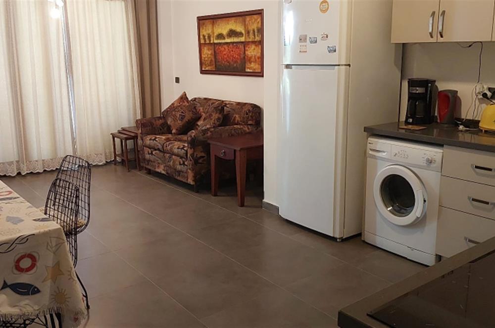 Bodrum-Bitez havuzlu site içerisinde eşyalı 2+1 bahçe katı kiralık daire