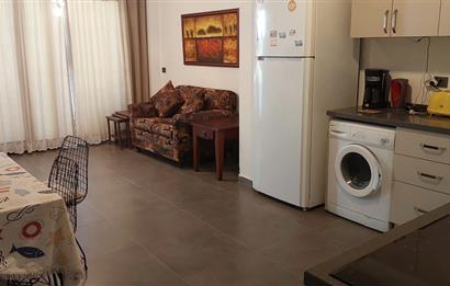 Bodrum-Bitez havuzlu site içerisinde eşyalı 2+1 bahçe katı kiralık daire