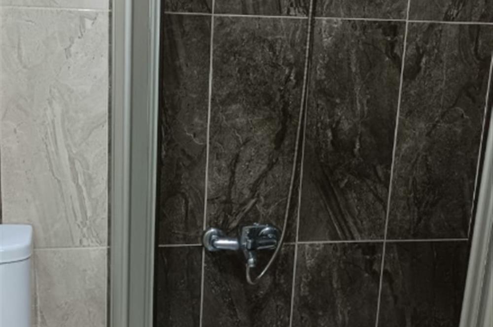 GENÇ BİNADA SATILIK    1+1  DAİRE SATILIKTIR