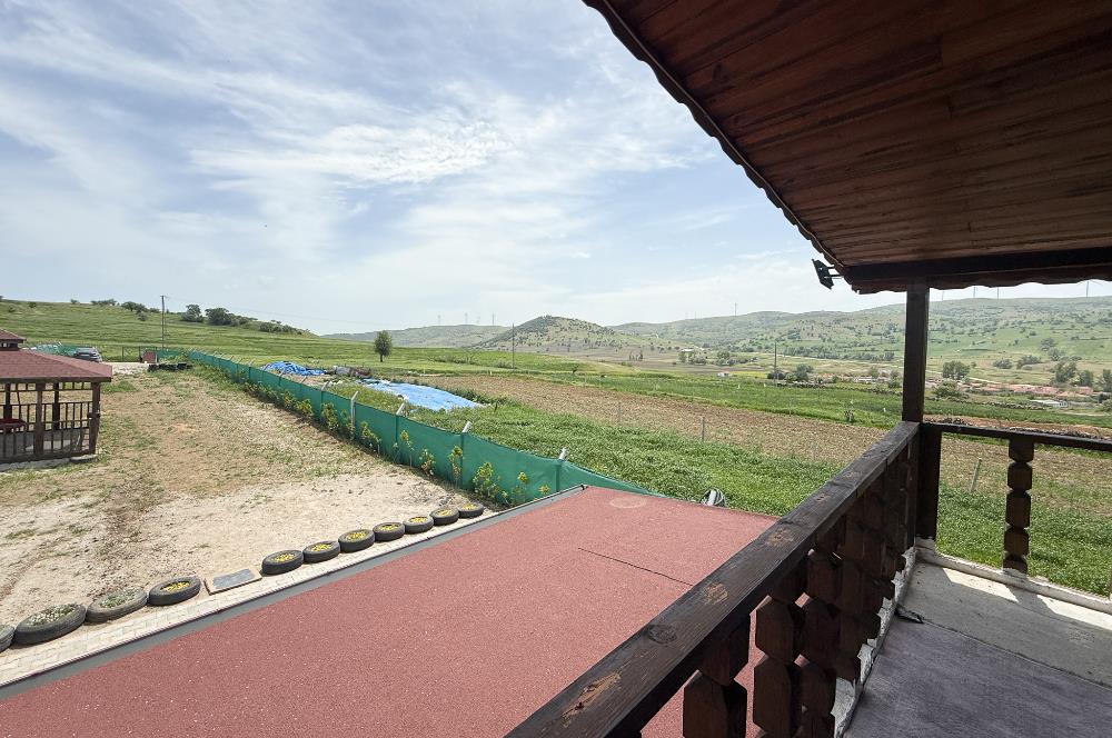 CENTURY21 BAL'DAN OVACIK MAH. SATILIK 2 KATLI AHŞAP EV VE TARLA