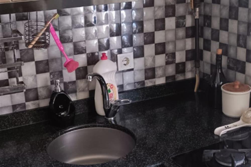 GENÇ BİNADA SATILIK    1+1  DAİRE SATILIKTIR