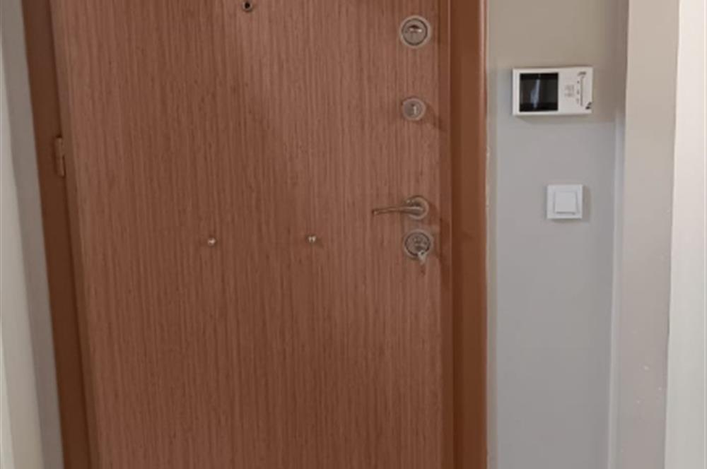 GENÇ BİNADA SATILIK    1+1  DAİRE SATILIKTIR