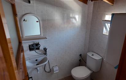 KUŞADASI MERKEZE VE PLAJA YAKIN HAVUZLU SİTEDE SATILIK 5+1 VİLLA