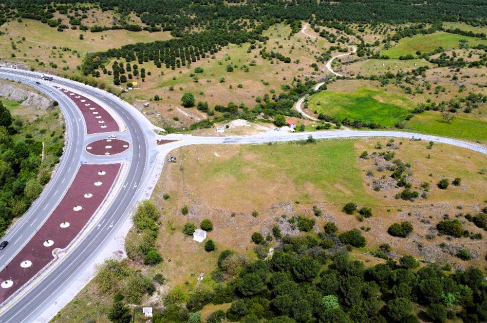 C21 MY MADRA DAN ANA ASFALTDA TİCARİ KULLANIMA UYGUN 9331 M2..