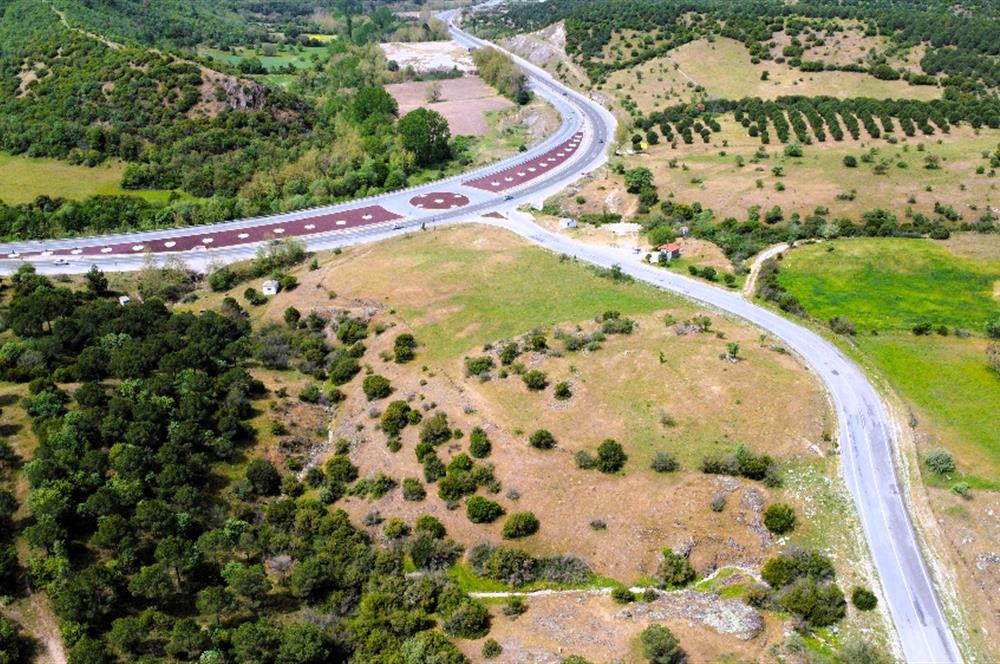 C21 MY MADRA DAN ANA ASFALTDA TİCARİ KULLANIMA UYGUN 9331 M2..