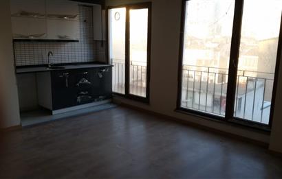 GÜMÜŞSUYU MAHALLESİNDE YENİ BİNADA SATILIK 1+1 DAİRE