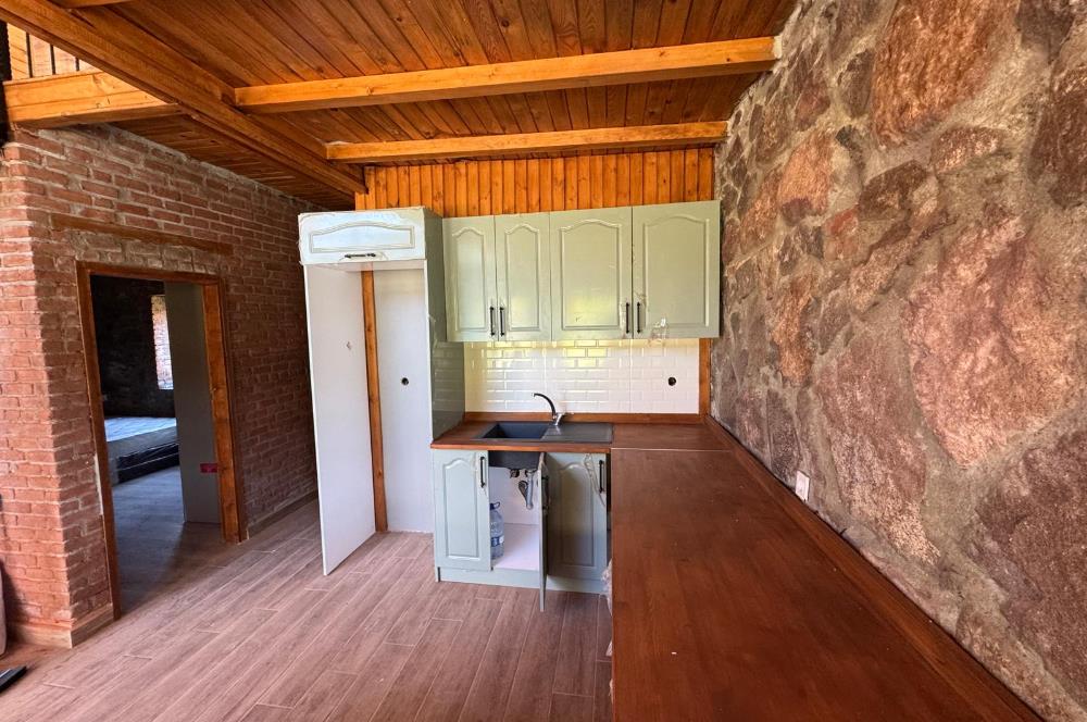 Bornova Yakaköy'de Satılık Loft Taş Ev