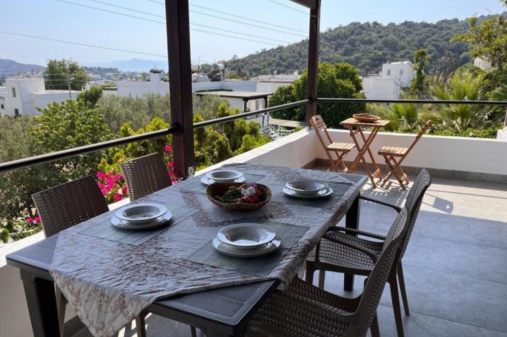 GÜMÜŞLÜK SAHİLE 1 KM DENİZ MANZARALI 2+1 EŞYALI YAZLIK DAİRE