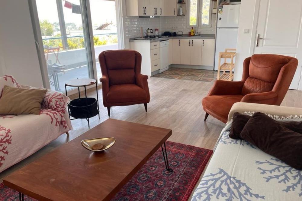 GÜMÜŞLÜK SAHİLE 1 KM DENİZ MANZARALI 2+1 EŞYALI YAZLIK DAİRE
