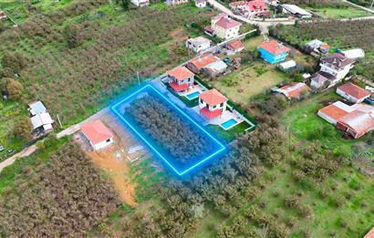 KAYNARCA BÜYÜKYANIK’ta 1000 m2 Yola Cepheli Doğa Manzaralı İmarlı Arsa