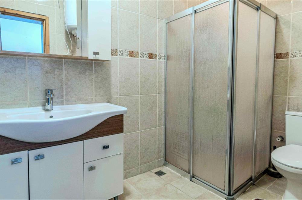 BODRUM KONACIK MERKEZİ KONUMDA ÖZEL OTOPARKLI BAHÇE KATI DAİRE