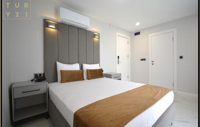 C21 NAR - FİNANS MERKEZİNİN YANINDA DEVREN SATILIK SUİT OTEL