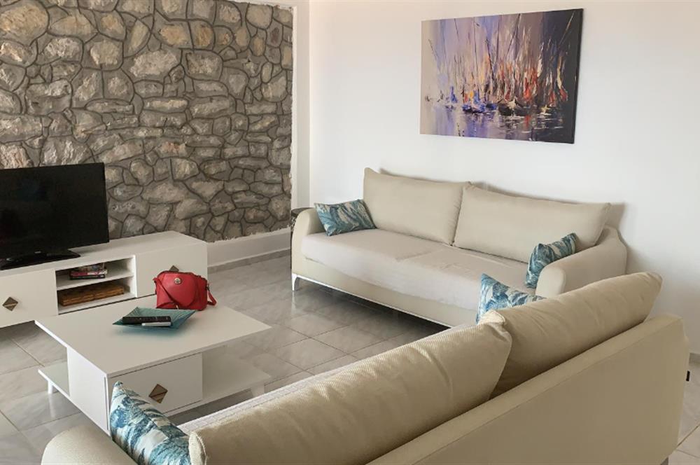 DATÇA MERKEZDE PANORAMİK DENİZ MANZARALI FULL EŞYALI KİRALIK2+1