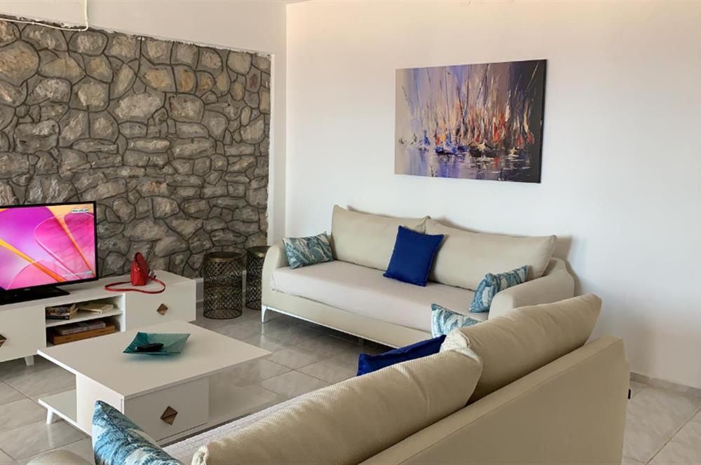 DATÇA MERKEZDE PANORAMİK DENİZ MANZARALI FULL EŞYALI KİRALIK2+1