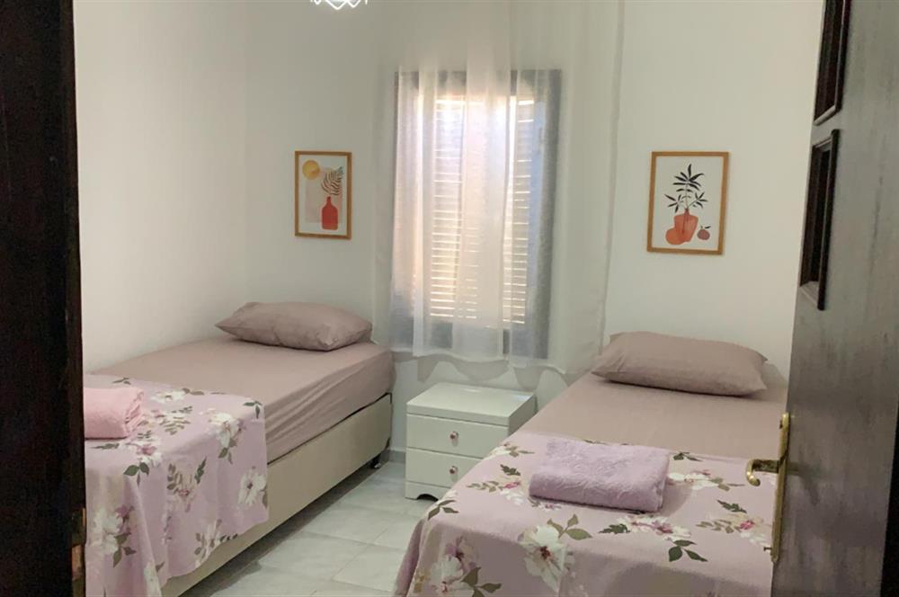 DATÇA MERKEZDE PANORAMİK DENİZ MANZARALI FULL EŞYALI KİRALIK2+1