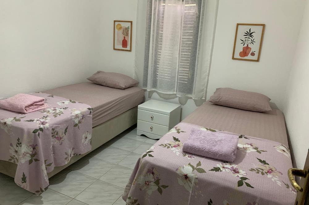 DATÇA MERKEZDE PANORAMİK DENİZ MANZARALI FULL EŞYALI KİRALIK2+1