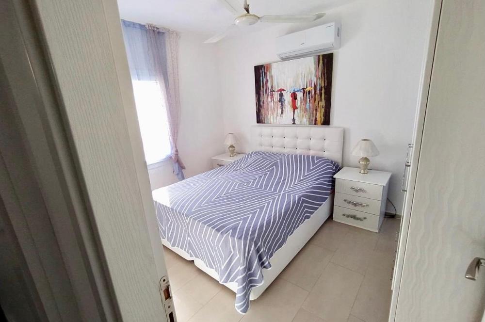 DATÇA MERKEZDE PANORAMİK DENİZ MANZARALI FULL EŞYALI KİRALIK2+1