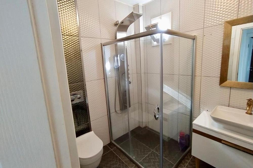 DATÇA MERKEZDE PANORAMİK DENİZ MANZARALI FULL EŞYALI KİRALIK2+1